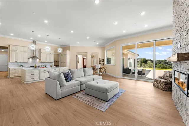 a bedroom with two beds and a couch