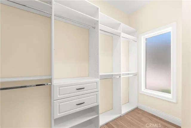 a view of a swimming pool with a lounge chair