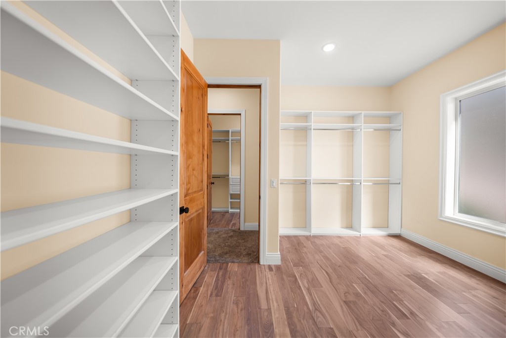 25700 El Chaval Place Temecula, CA 92590 - Photo 51 of 66 a view of wooden floor in a room
