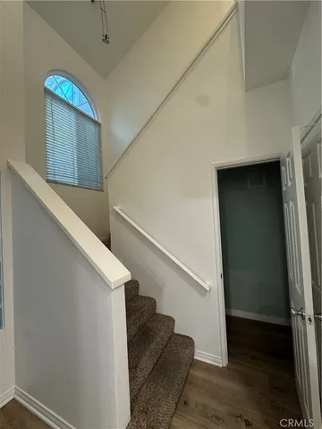 a view of a hallway with washer and dryer