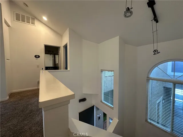 a view of livingroom with floor to ceiling window