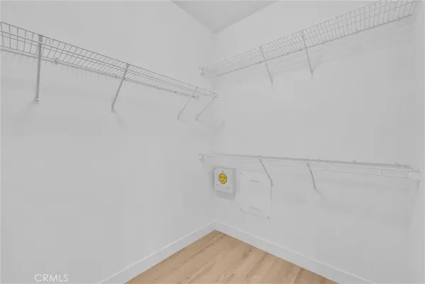 a view of a room with racks on the wall
