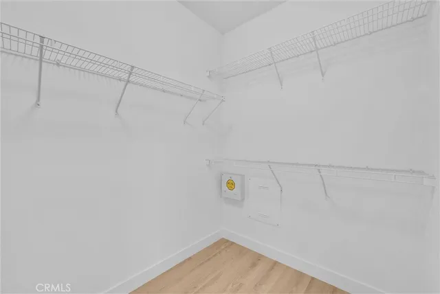 a view of a room with racks on the wall