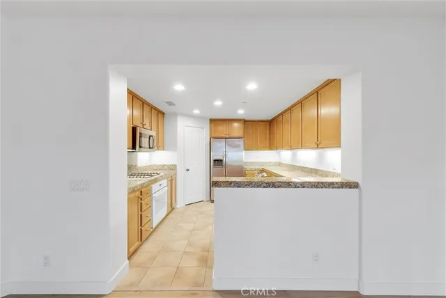 a view of a kitchen with a sink