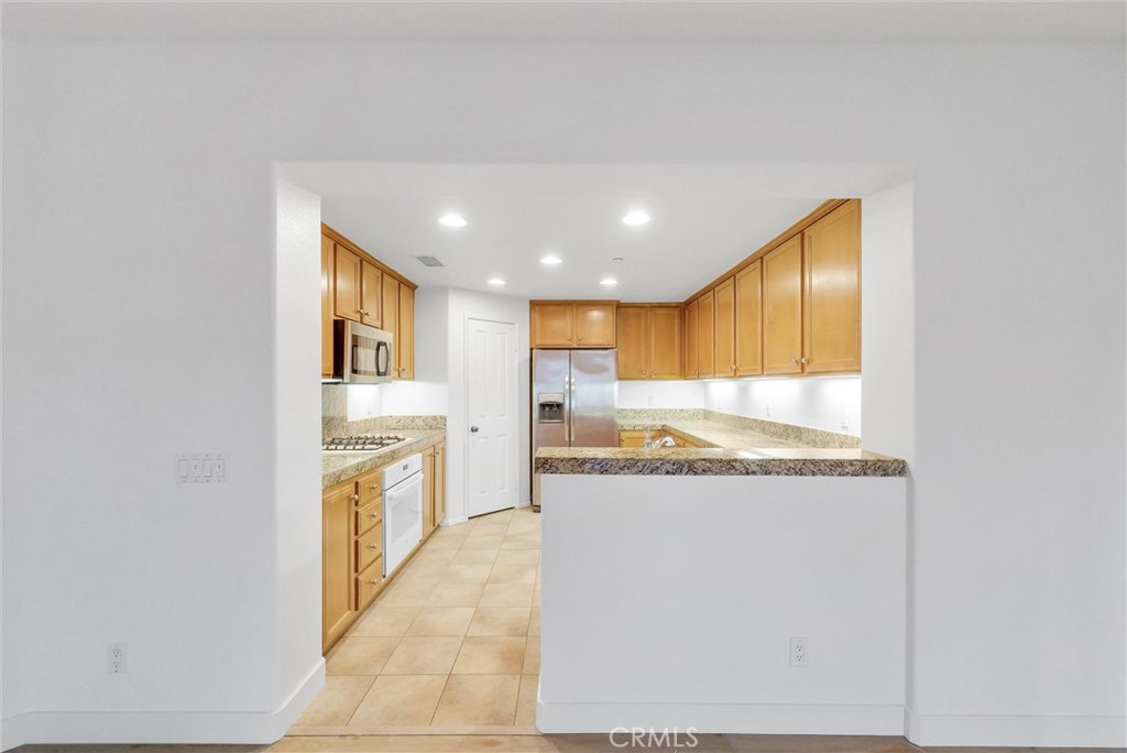 211 Lockford Irvine, CA 92602 - Photo 20 of 47 a view of a kitchen with a sink
