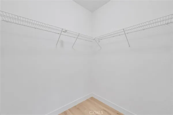 a view of a room with racks on the wall