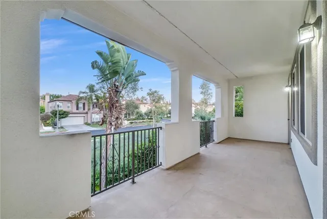 a view of a porch and garden
