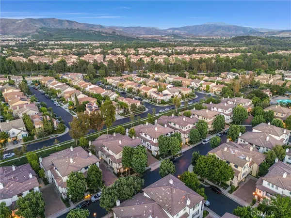an aerial view of a city with lots of residential buildings