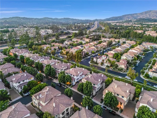 an aerial view of a city with lots of residential buildings