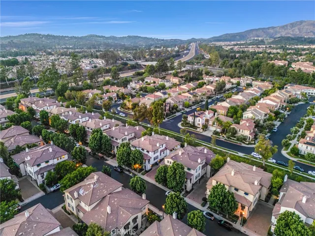 an aerial view of a city with lots of residential buildings