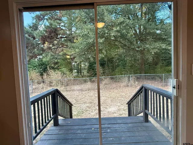 a kitchen with granite countertop a stove and a sink
