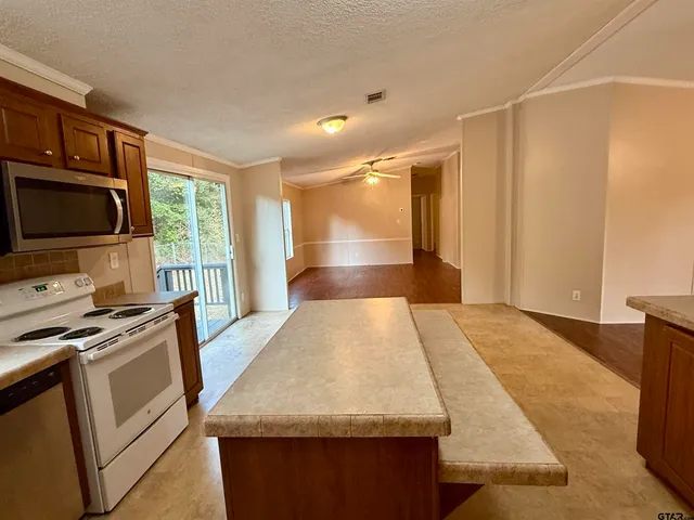 a view interior of a house wooden floor and an entryway