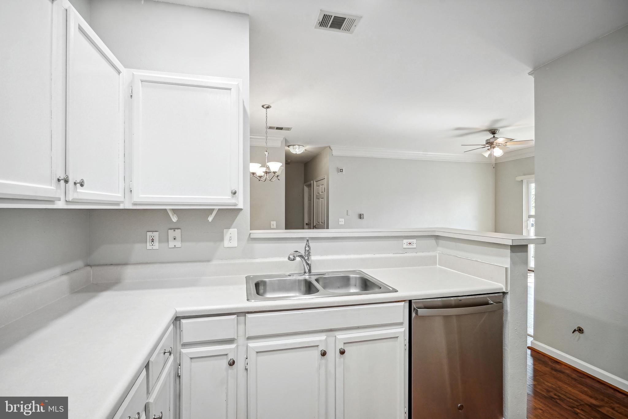1601 Spring Gate Dr., Unit 1210 McLean, VA 22102 - Photo 6 of 18 a bathroom with a sink and a mirror