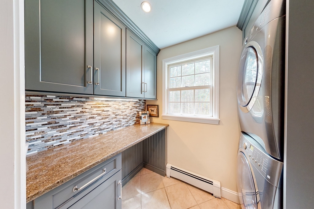 1 Chestnut Lane Medfield, MA 02052 - Photo 14 of 42 a view of a kitchen cabinets and wooden floor