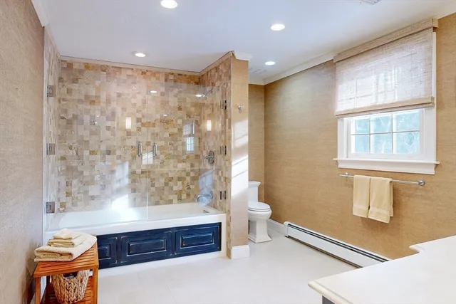 a bathroom with a granite countertop sink mirror and double