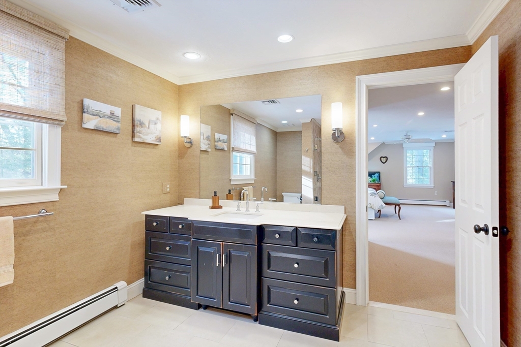1 Chestnut Lane Medfield, MA 02052 - Photo 22 of 42 a bathroom with a granite countertop sink mirror and double