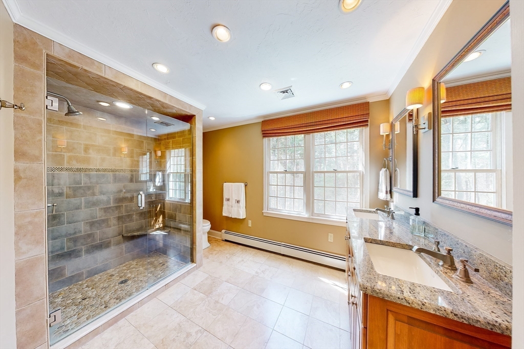 1 Chestnut Lane Medfield, MA 02052 - Photo 25 of 42 a bathroom with a granite countertop tub sink and shower