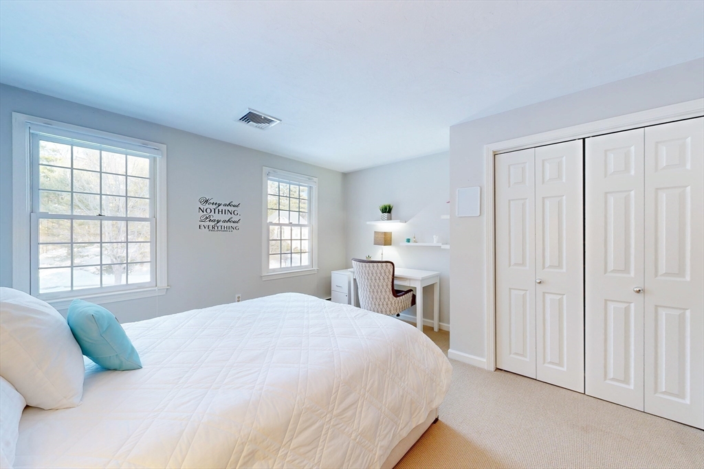 1 Chestnut Lane Medfield, MA 02052 - Photo 28 of 42 a bedroom with a bed and a window