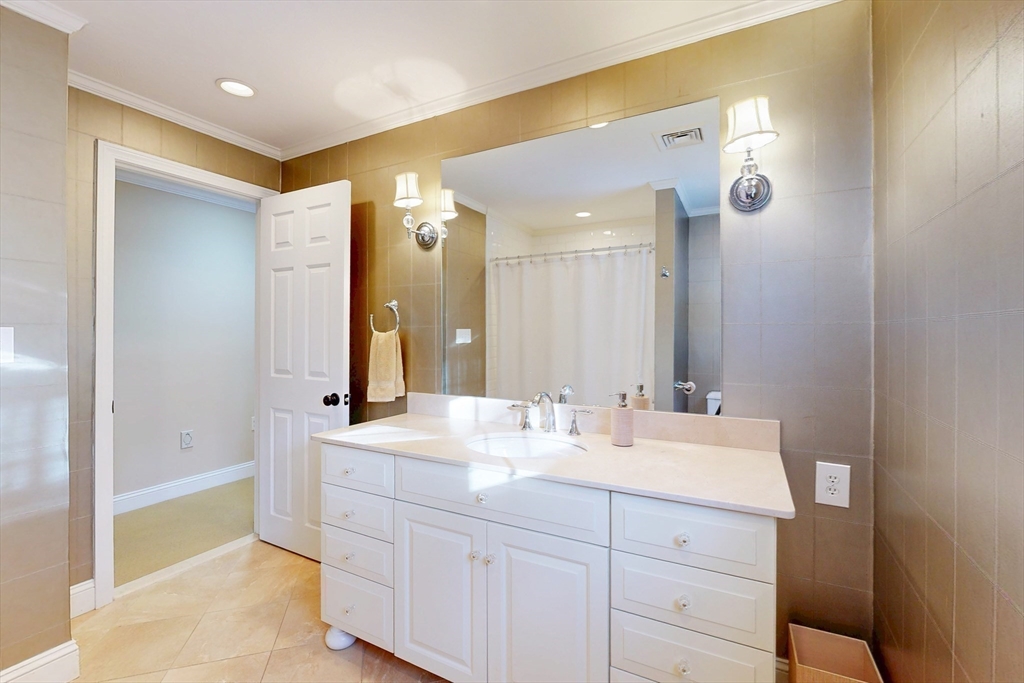 1 Chestnut Lane Medfield, MA 02052 - Photo 29 of 42 a bathroom with a double vanity sink mirror and double