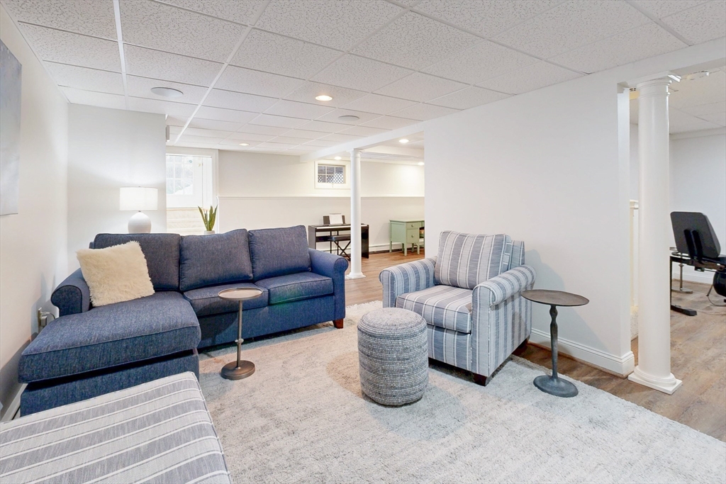 1 Chestnut Lane Medfield, MA 02052 - Photo 35 of 42 a living room with furniture and a couch