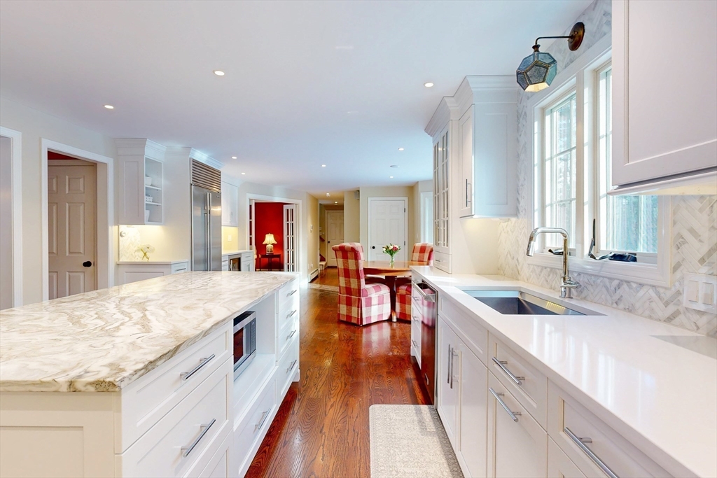 1 Chestnut Lane Medfield, MA 02052 - Photo 5 of 42 a large kitchen with sink and cabinets