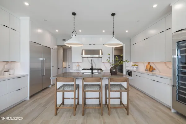 a view of a kitchen and dining room