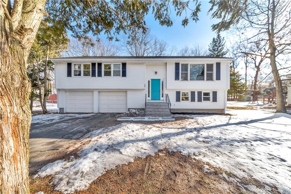 260 Sonstrom Road Bristol, CT 06010 - Photo 1 of 1 front view of a house with a yard