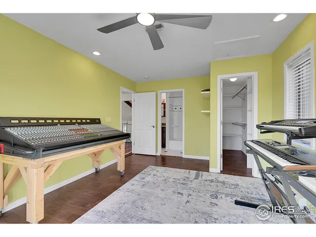 a kitchen with stainless steel appliances kitchen island a stove and a sink