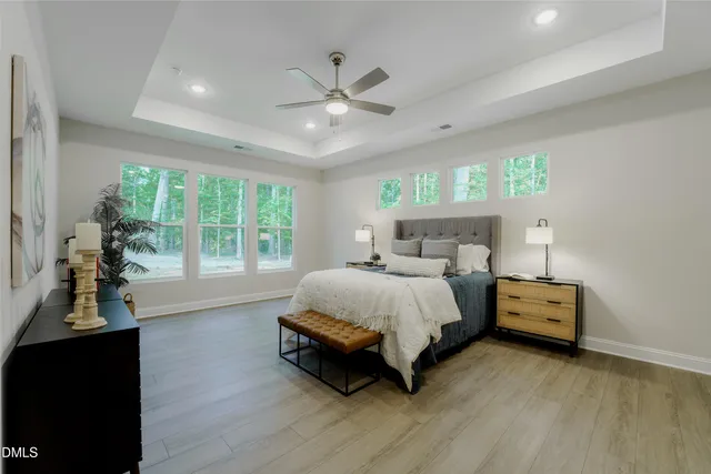 a bed room with a bed and a window