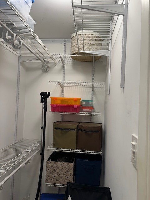 6480 Bayou Glen Road Houston, TX 77057 - Photo 10 of 12 a utility room with closet and windows