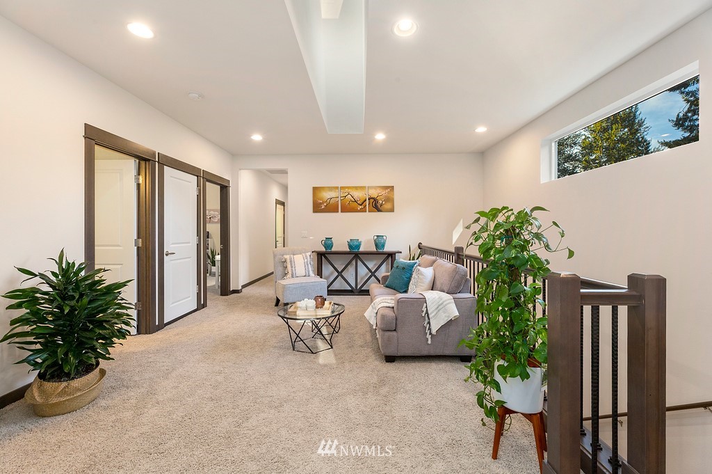 17507 3rd Avenue Southeast Bothell, WA 98012 - Photo 13 of 40 a living room with furniture potted plant and a window