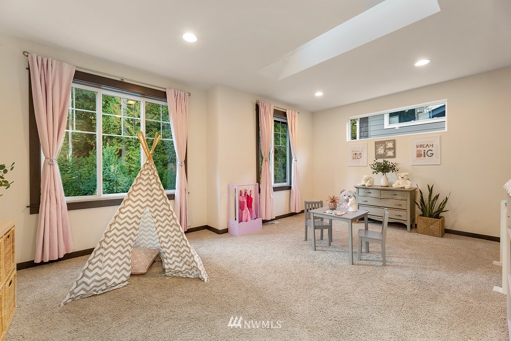 17507 3rd Avenue Southeast Bothell, WA 98012 - Photo 15 of 40 a living room with furniture and a large window