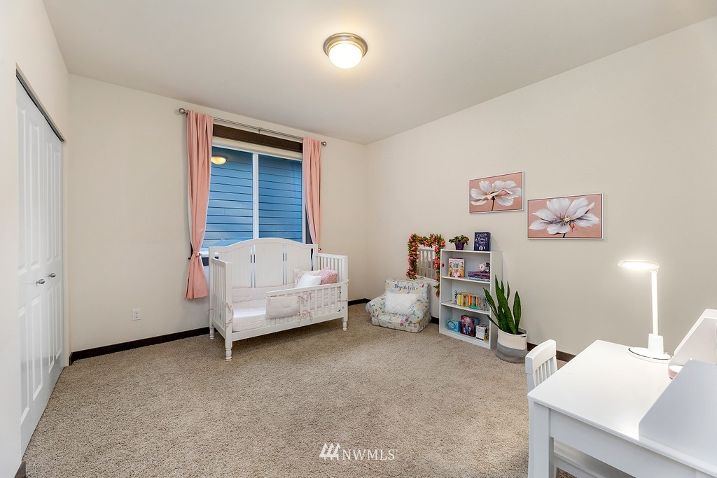 17507 3rd Avenue Southeast Bothell, WA 98012 - Photo 17 of 40 a bedroom with furniture and a couch