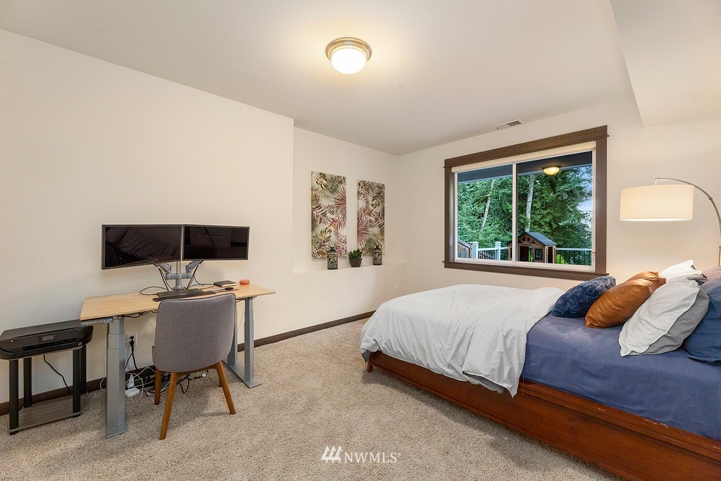 17507 3rd Avenue Southeast Bothell, WA 98012 - Photo 23 of 40 a bedroom with a bed and a window