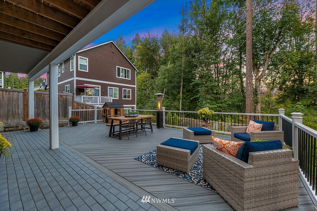 17507 3rd Avenue Southeast Bothell, WA 98012 - Photo 28 of 40 a view of a roof deck with couches and wooden floor