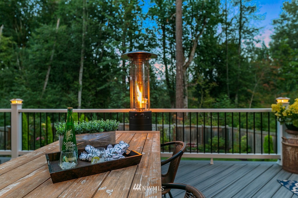 17507 3rd Avenue Southeast Bothell, WA 98012 - Photo 36 of 40 a view of a balcony with wooden floor and outdoor seating