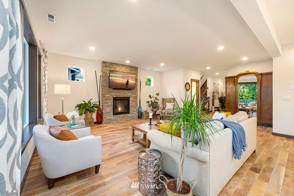 17507 3rd Avenue Southeast Bothell, WA 98012 - Photo 7 of 40 a living room with furniture fireplace and potted plant