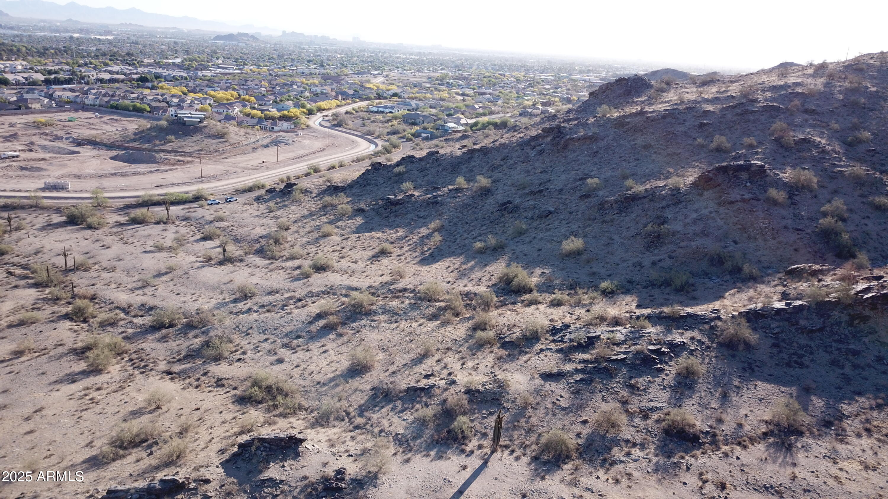 3670 East Highline Canal Road Phoenix, AZ 85042 - Photo 12 of 17 a view of a dry field