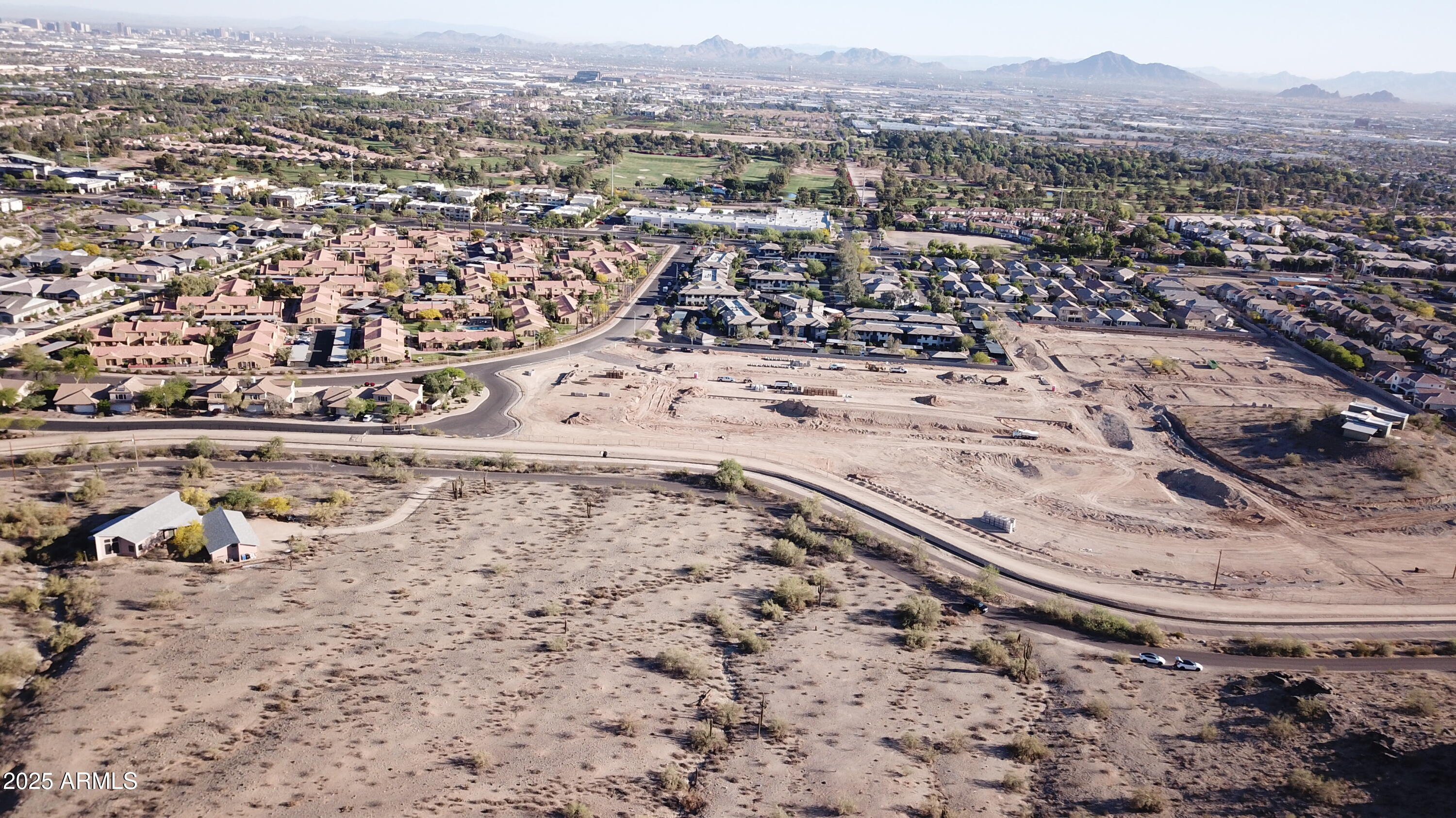 3670 East Highline Canal Road Phoenix, AZ 85042 - Photo 15 of 17 an aerial view of a house with a mountain