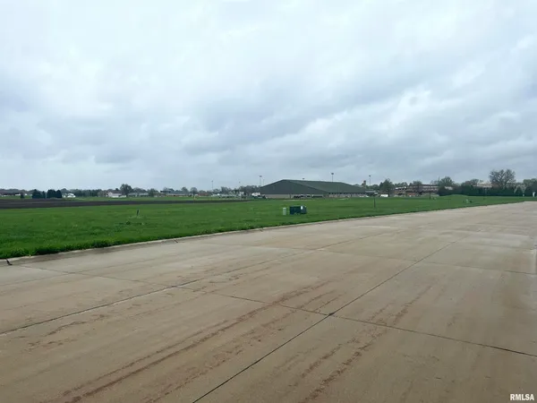 a view of a field and a yard
