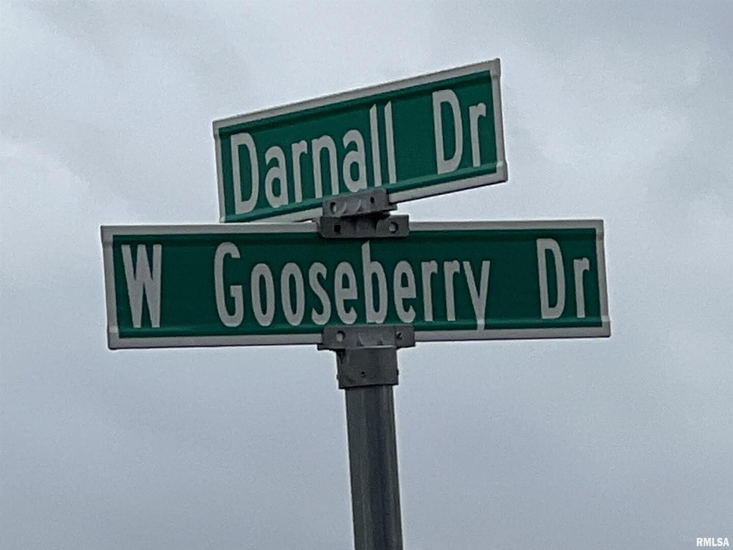 819 Darnall Drive Geneseo, IL 61254 - Photo 4 of 6 a street sign that is on a pole