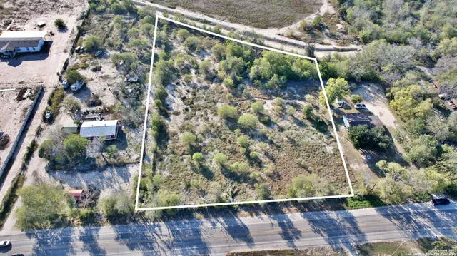 a view of a city with mountains in the background