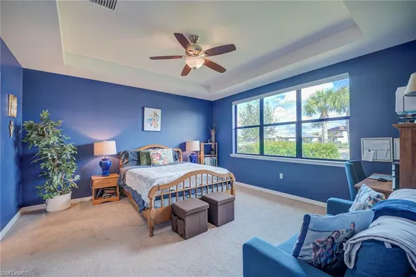 a bed room with a bed and a couch