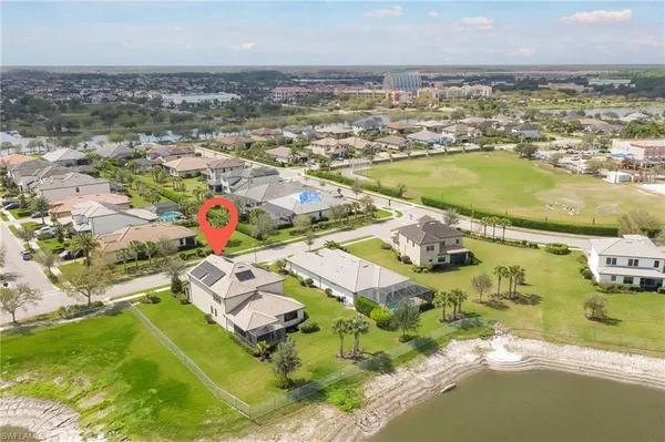 an aerial view of a house with a garden