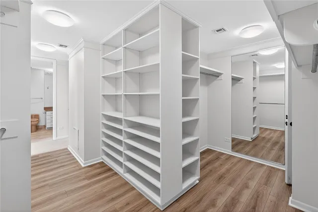 a view of a room that has a large window