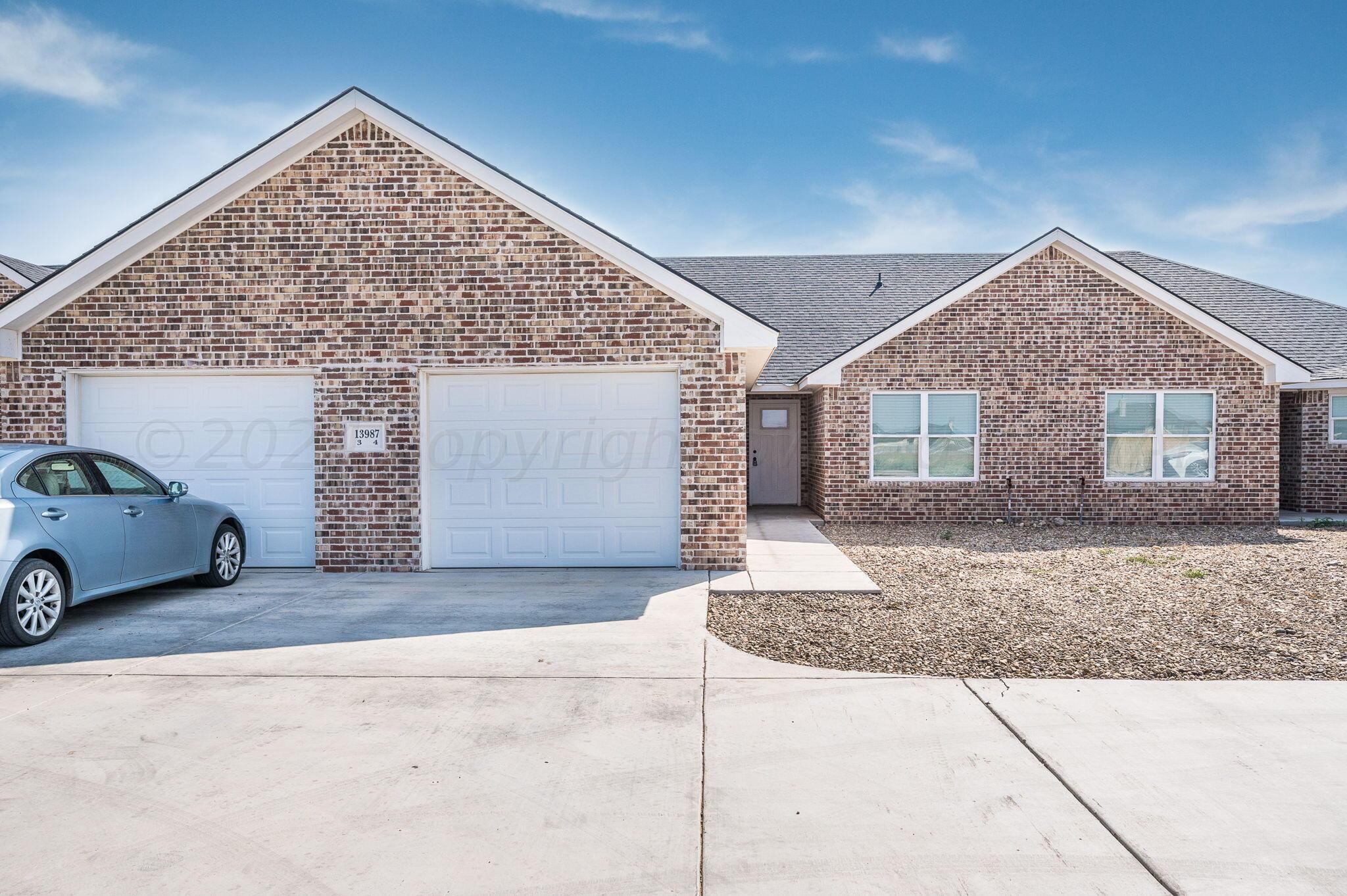 13987 Periwinkle Drive, Unit 1 Amarillo, TX 79119 - Photo 2 of 20 a view of a house with a outdoor space