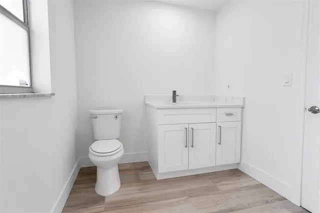 a bathroom with a sink and a toilet