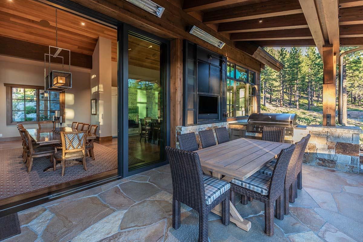 8094 Fallen Leaf Way Truckee, CA 96161 - Photo 28 of 28 a view of a patio with table and chairs and potted plants