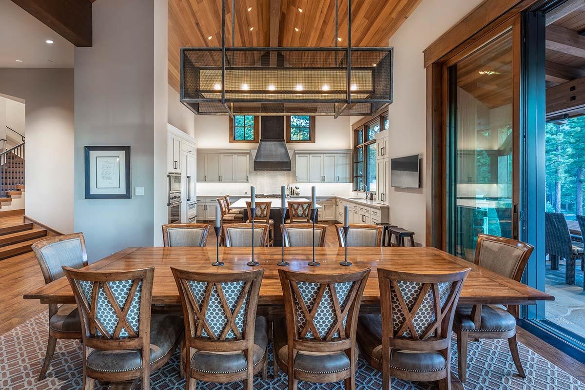 8094 Fallen Leaf Way Truckee, CA 96161 - Photo 8 of 28 a dining room with furniture a chandelier and wooden floor