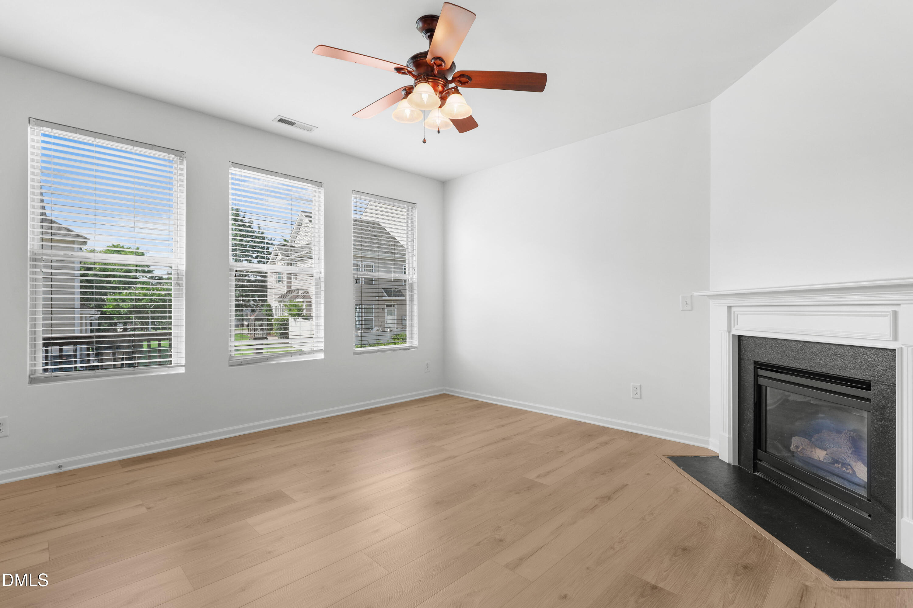 4400 Hillsgrove Road Wake Forest, NC 27587 - Photo 12 of 49 a view of empty room with fan and window